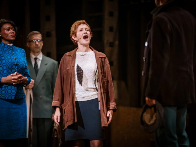 Peggy White sings mid-confrontation, Baroness Tynedale and a manager looking on.